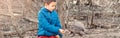 Caucasian boy feeding grey squirrel in park outdoors. Adorable little kid giving food nuts to wild animal in forest. Child Royalty Free Stock Photo