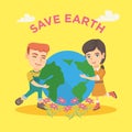 Caucasian boy and girl hugging the Earth planet. Royalty Free Stock Photo