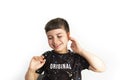 Caucasian boy making gesture of not hearing on white background