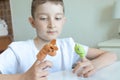 A caucasian boy playing different roles by using finger puppets, toys for expressing his emotions, agression, fear and freandship Royalty Free Stock Photo