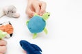 A caucasian boy playing finger puppets, toys, dolls - figures of animals, heroes of the puppet theatre put on fingers of human Royalty Free Stock Photo