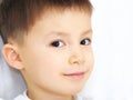Caucasian boy portrait smiling, peripheral vision