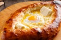 Caucasian bread ajarian khachapuri with egg