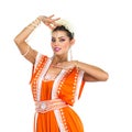 Caucasian brunette woman in orange indian national dress sari Royalty Free Stock Photo