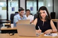 Caucasian business people wearing medical face shield during work in the office at the time of covid or coronavirus pandemic Royalty Free Stock Photo