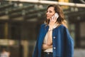 Caucasian business woman speaking by phone. Waist up portrait of a successful European business woman woman, talking on the phone Royalty Free Stock Photo