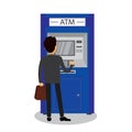 Caucasian businessman and ATM bank terminal,human back view