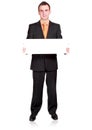 Caucasian businessman with empty,blank white card. Royalty Free Stock Photo