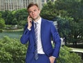 Caucasian businessman making phone call and looking stressed Royalty Free Stock Photo