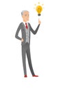 Caucasian businessman pointing at idea lightbulb. Royalty Free Stock Photo