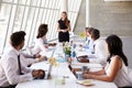 Caucasian Businesswoman Leading Meeting At Boardroom Table Royalty Free Stock Photo