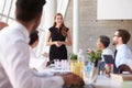 Caucasian Businesswoman Leading Meeting At Boardroom Table Royalty Free Stock Photo