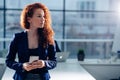 Businesswoman Outside Office On Mobile Phone Royalty Free Stock Photo