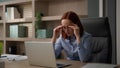 Caucasian businesswoman working with laptop in office tired of glasses woman eyestrain with computer work taking off Royalty Free Stock Photo