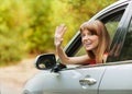 Caucasian car driver woman smiling Royalty Free Stock Photo