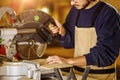 Carpenter preparing wooden furniture for customers, work on an order Royalty Free Stock Photo