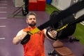Caucasian man exercising suspension training trx at gym. Royalty Free Stock Photo