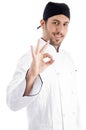 Caucasian chef showing okay hand gesture