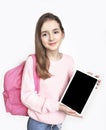 Caucasian child hold tablet on white background.Young girl teen age showing empty screen. Advertisement blank.Female person