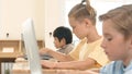 Caucasian child programing software system and learning about coding. Pedagogy. Royalty Free Stock Photo