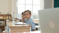 Caucasian child programing software system and learning about coding. Pedagogy. Royalty Free Stock Photo