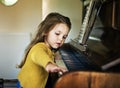 Caucasian children playing piano concept Royalty Free Stock Photo