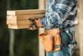 Contractor With Wood Beams Royalty Free Stock Photo