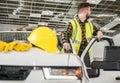 Caucasian Construction Site Worker and His Pickup Truck Royalty Free Stock Photo