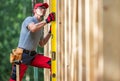 Caucasian Construction Worker with Bubble Spirit Level Royalty Free Stock Photo