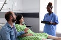 Caucasian couple expecting child in hospital ward Royalty Free Stock Photo