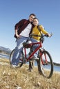 Caucasian Couple Standing Together With A Bicycle Royalty Free Stock Photo