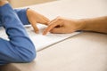 Caucasian elementary school child doing homework at the end of the school day with parental help and support. Royalty Free Stock Photo