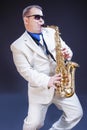 Caucasian Expressive Mature Playing Saxophonist