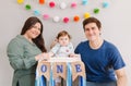 Mother father dad taking selfie with child kid toddler. Caucasian family with baby boy celebrating first birthday at home. Cupcake Royalty Free Stock Photo