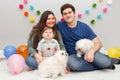 Caucasian family with baby boy celebrating his first birthday at home. Proud parents mother and father dad together with a child Royalty Free Stock Photo