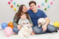 Caucasian family with baby boy celebrating his first birthday at home. Proud parents mother and father dad together with child kid Royalty Free Stock Photo