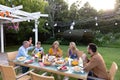 Caucasian family at home in their garden