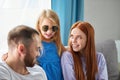 Caucasian family with kid girl discuss what to take with them for holiday, vacation Royalty Free Stock Photo