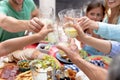 Caucasian family sitting at table during a family lunch in the garden Royalty Free Stock Photo