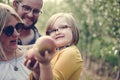 A Caucasian family is spending time at the farm together Royalty Free Stock Photo