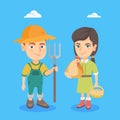 Caucasian boy and girl with chicken and rake.