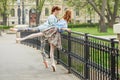 Caucasian fashion ballerina walking in the park