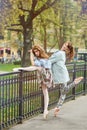 Caucasian fashion ballerina walking in the park