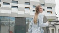 Caucasian female office worker rushing on her business with folders. Pretty woman business worker. Job, activity Royalty Free Stock Photo