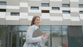 Caucasian female office worker rushing on her business with folders. Pretty woman business worker. Job, activity Royalty Free Stock Photo