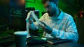 Caucasian focused man programmer checking coding guy coder male professional digital engineer IT support drinking coffee