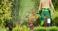 Caucasian Garden Worker with Pro Scissors in His Hands Royalty Free Stock Photo