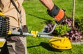 Gardener with String Trimmer Royalty Free Stock Photo