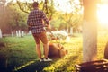 Caucasian Gardener working with lawnmower and cutting grass Royalty Free Stock Photo