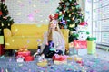 Caucasian girl funny with colorful confetti Paper fireworks in christmas time and celebrating new year party. Lifestyle on holiday Royalty Free Stock Photo